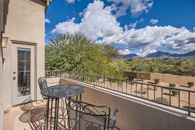 Upper balcony accessible from primary bedroom - 19475 N Grayhawk Dr