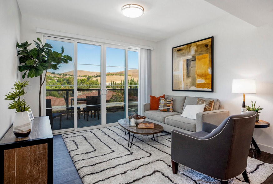 YOLO East furnished living area and patio - The Harrington