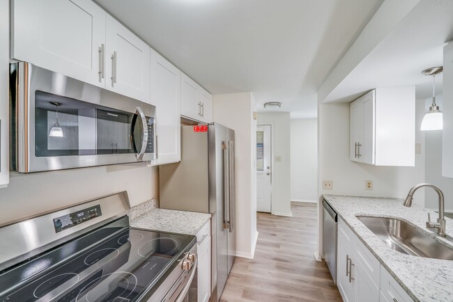 Building Photo - Fully Renovated 2BR Home with New Deck & L...