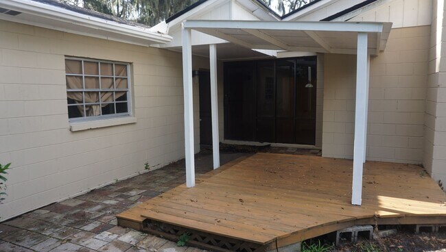 Building Photo - Four Bed - Three Bath - Large Storage Area...