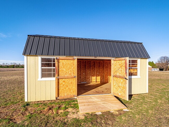Building Photo - Available now! Has solar panels!