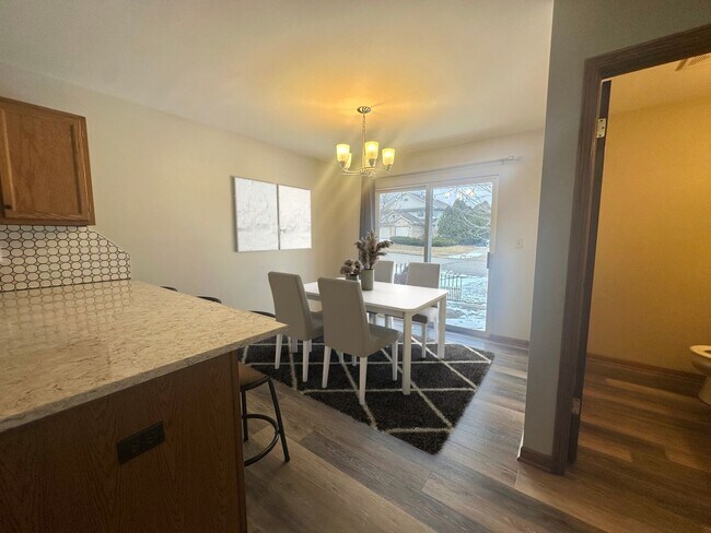 Building Photo - Charming Pewaukee Townhome with Modern Touches and Ample Space