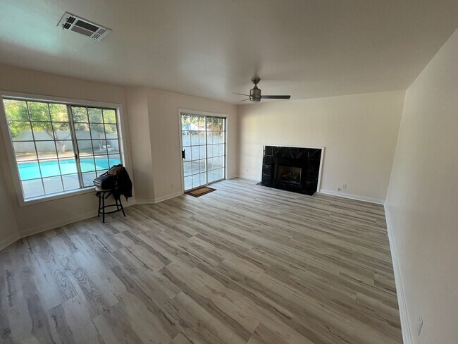 Building Photo - Reseda 4+3 w/fireplace, vaulted ceilings, new flooring, solar panels, + pool!