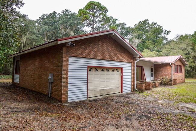 Building Photo - Tucked Away Three Bedroom Home