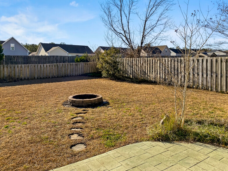 Backyard and Firepit - 213 Red Carnation Dr