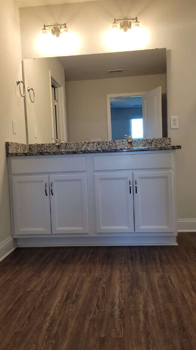 Building Photo - Coming Soon!!!  "Spacious 4-Bedroom Retrea...