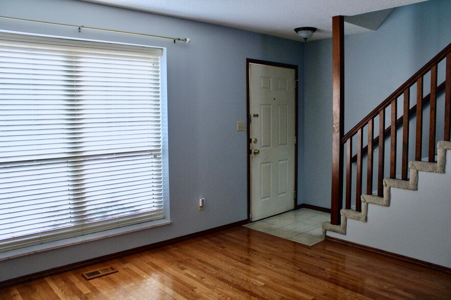 View (2) from Living Room to Front Door - 10523 Briston Ct