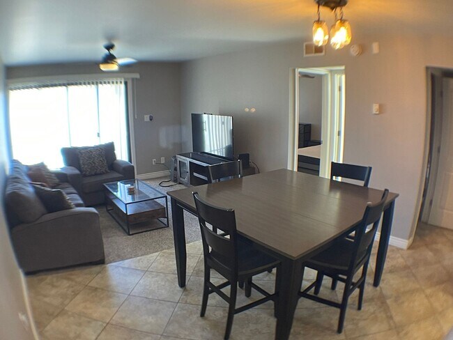 Building Photo - Furnished 2BR Condo with Dual Primary Suit...
