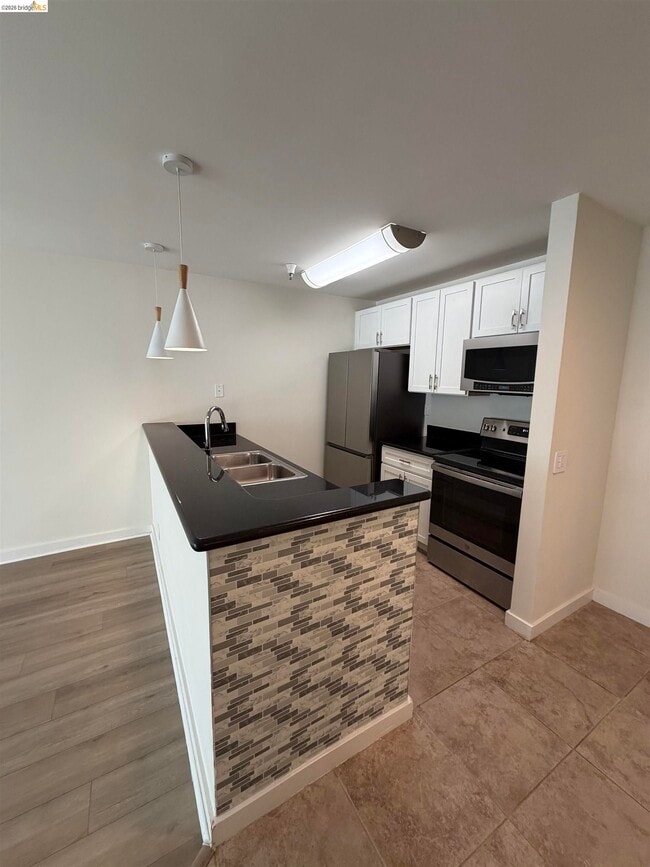 Building Photo - 6400 Christie Ave