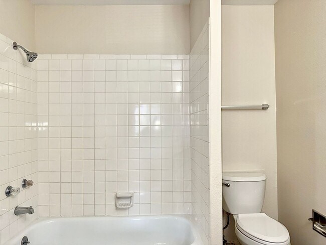 Building Photo - Updated Two Bed Townhome Nestled in the He...