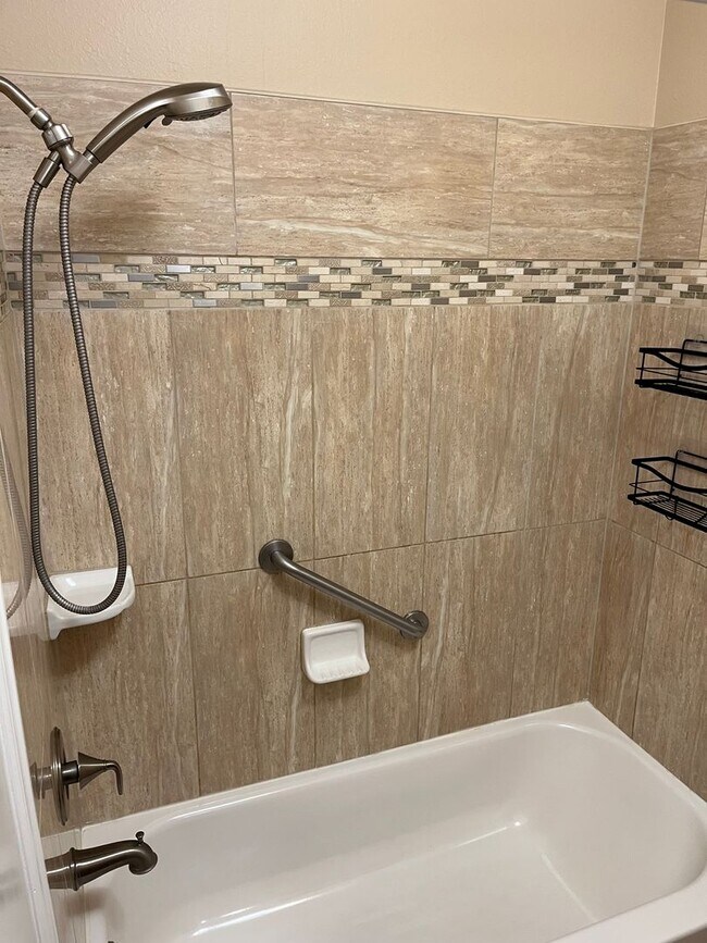 Building Photo - 4 Bedroom Gardener's Delight With Rooftop Patio, Privacy and Covered Parking