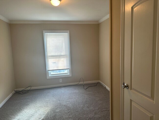 Building Photo - Four-Bedroom Bungalow with Fenced Yard Near Downtown Durham!