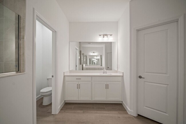 Building Photo - NEW CONSTRUCTION 3beds+Den 3 baths located...