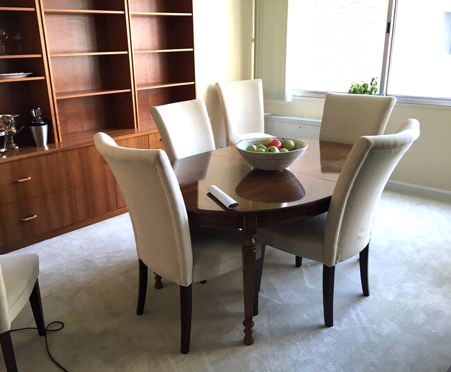 Living Room with large build in shelves/book case - 5500 Friendship Blvd