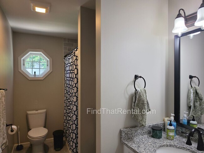 Building Photo - Available August 16! A pet friendly ranch with dishwasher, garage, basement, storage, yard, deck
