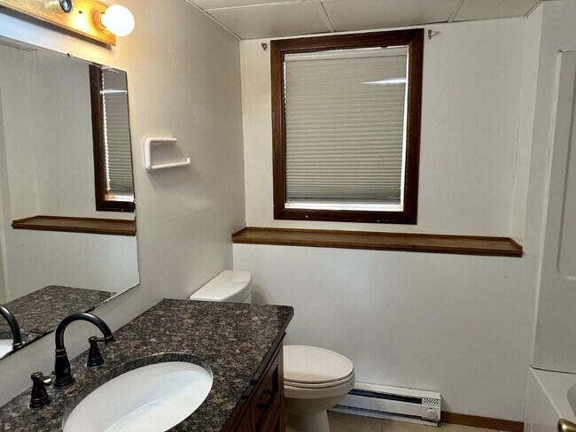 Building Photo - You've found it. This spacious 4-bedroom, 2-bathroom gem in Duluth's Kenwood neighborhood has a l...