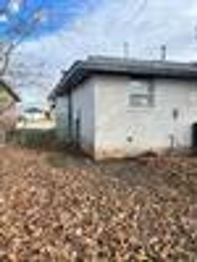 Building Photo - Totally renovated 3/2/2 carport