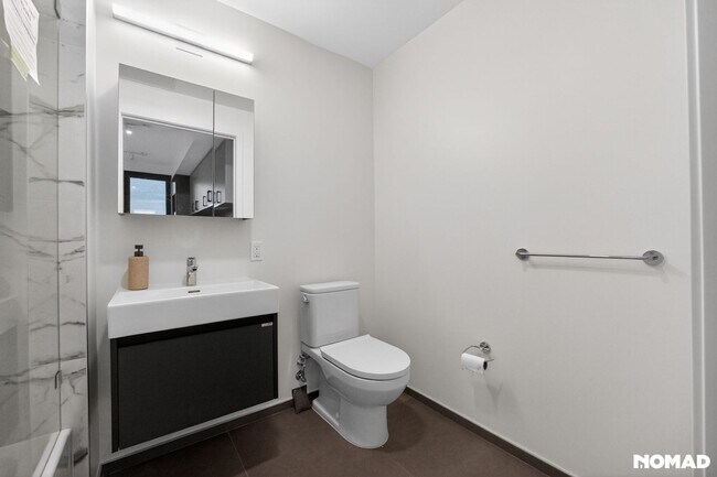 Building Photo - Act Fast: Luxury SoMa Corner Unit w/ EV Parking & Views