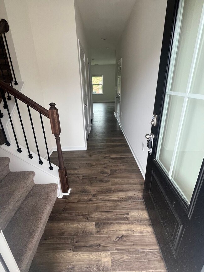 Building Photo - Brand New Townhome – Modern Comfort & Conv...