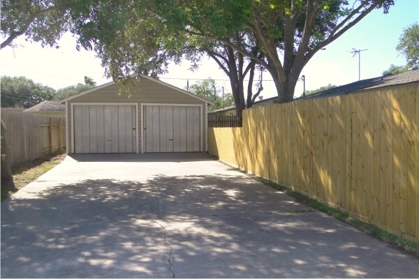 Double Car Garage with Automatic Door Openers. Double Wide Driveway. - 4115 Robinhood Dr