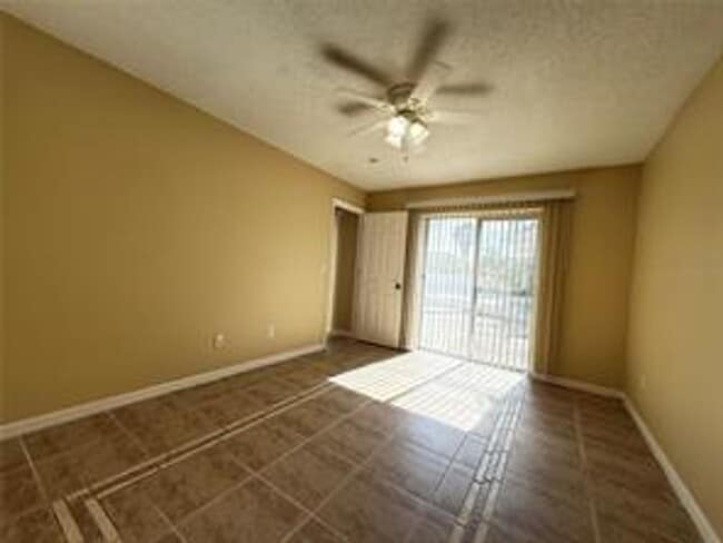 Building Photo - Charming 3-bed, 2-bath POOL home with 2-car garage. Features ceramic tile flooring, updated kitch...