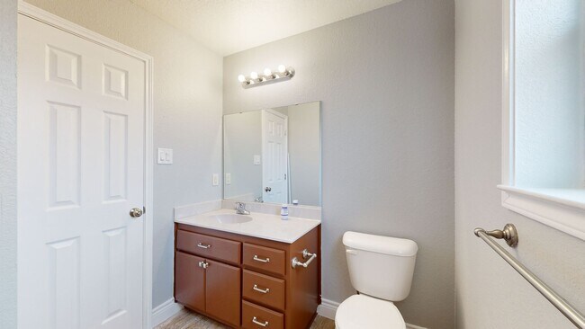Building Photo - Completely repainted 4 bedroom ALL TILE ho...