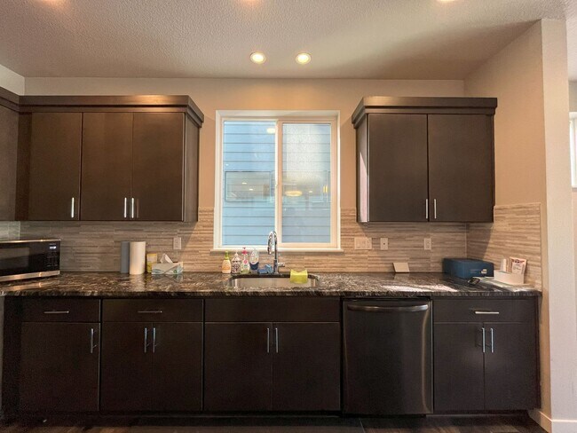 Building Photo - Three-Level Modern Living with Open Floor ...