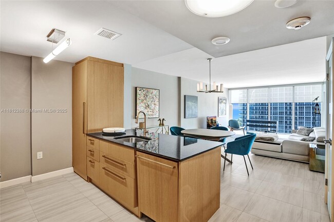 Building Photo - 10275 Collins Ave