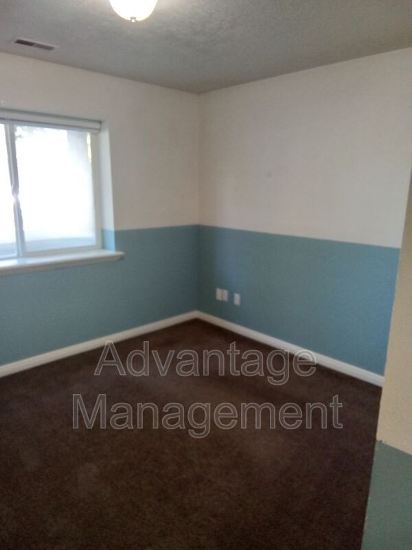 Building Photo - 8083 N Ridge Loop E