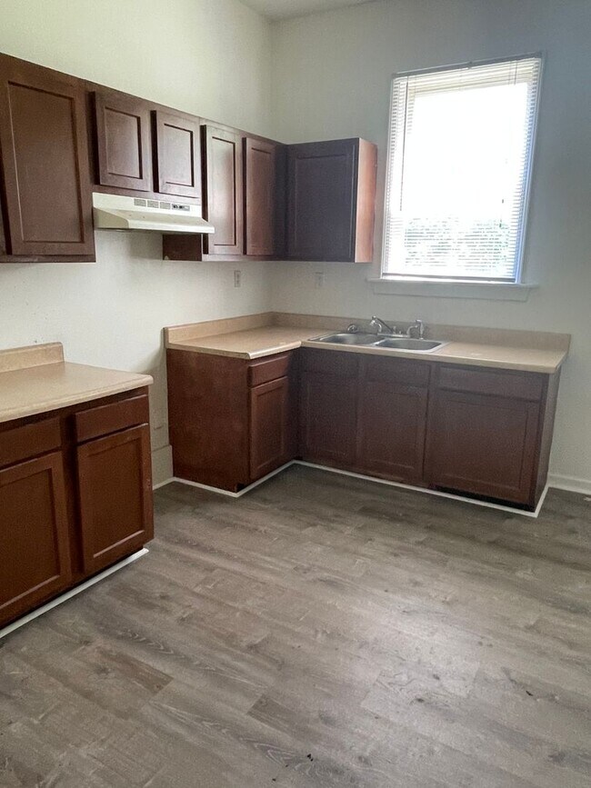 Building Photo - Updated three bedroom two bathroom home in...