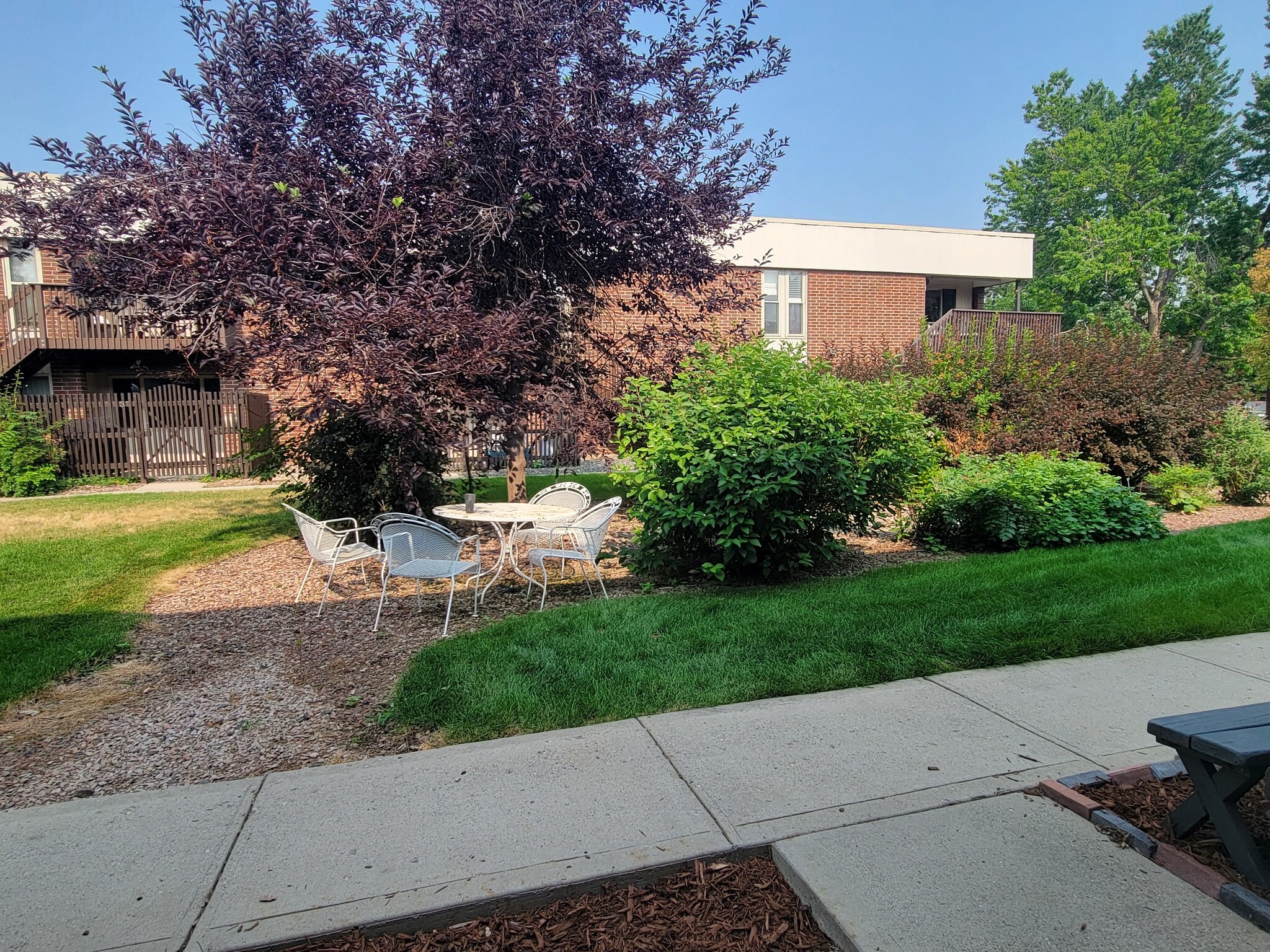 Shared outdoor eating area - 3663 S Sheridan Blvd