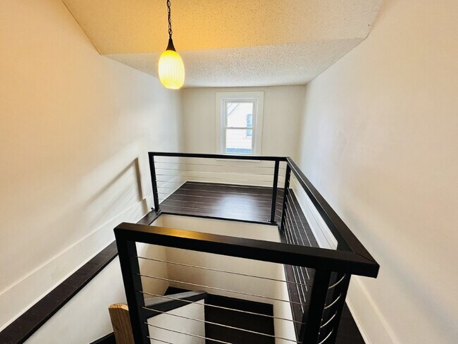 Building Photo - "Spacious 6-Bedroom Gem with Gleaming New Hardwood Floors in Minneapolis!"