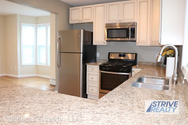 Building Photo - 4 br, 3 bath House - 2 Eva St