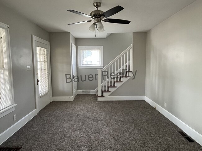 Building Photo - Three bedroom home with two car, detached garage!