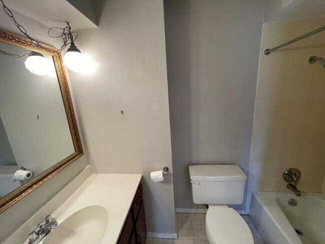 Building Photo - 3 bed 2 bath, 2 car with wood floors, fenc...