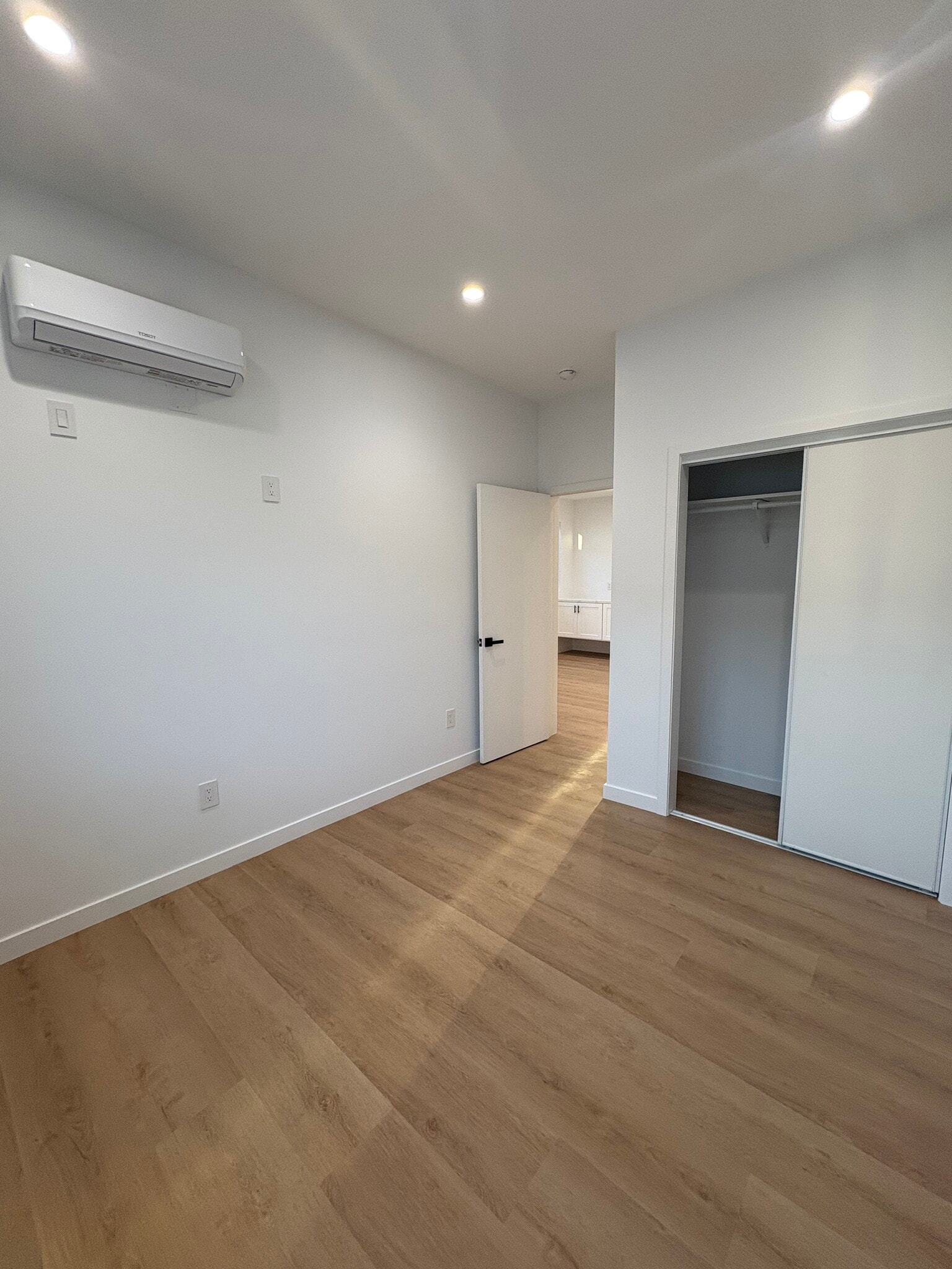Primary bedroom with air conditioning in each room. - 7834 S Harvard Blvd