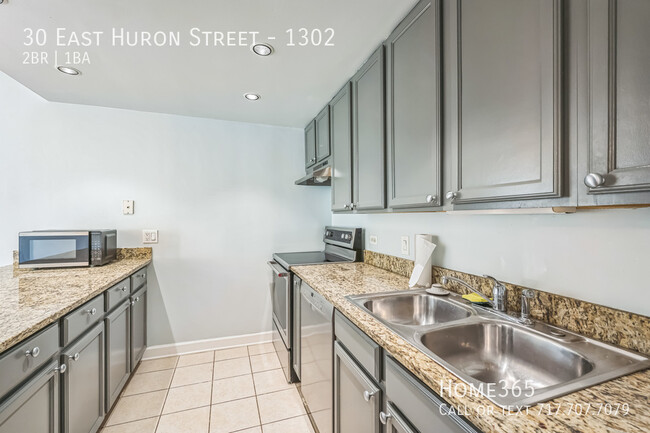 Building Photo - Modern 2-Bed, 1-Bath Condo in the Heart of...