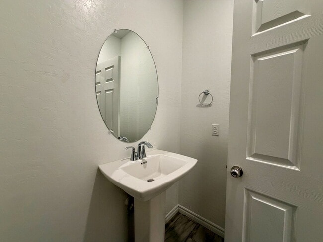 Building Photo - GATED 3 BED 2.5 BATH TOWNHOME WITH 2-CAR GARAGE, COVERED PATIO & COMMUNITY POOL