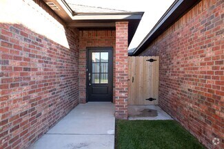 Building Photo - Stunning New 3/2 Townhomes