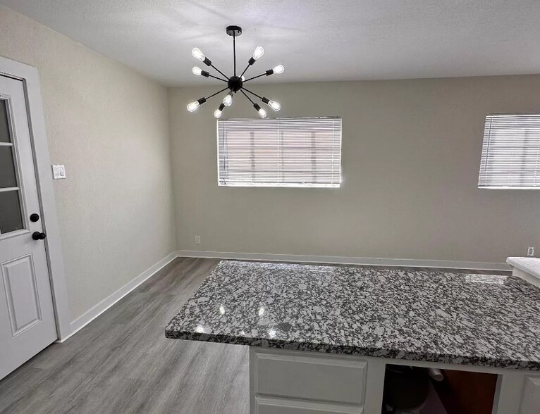 Building Photo - 8100 Sandland Dr