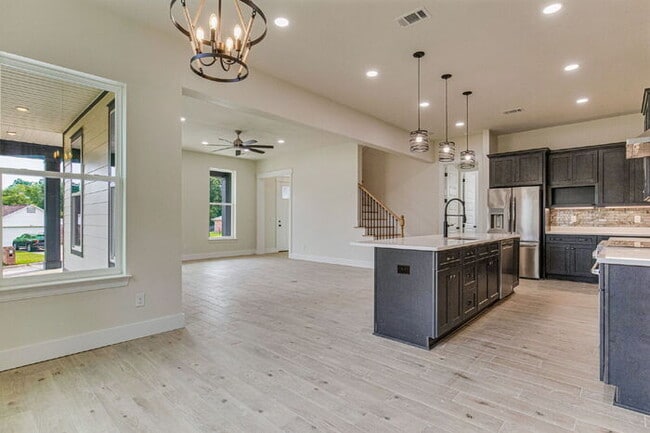 Building Photo - This luxurious new custom home in the sought-after Shadow Grove subdivision is a masterpiece of m...