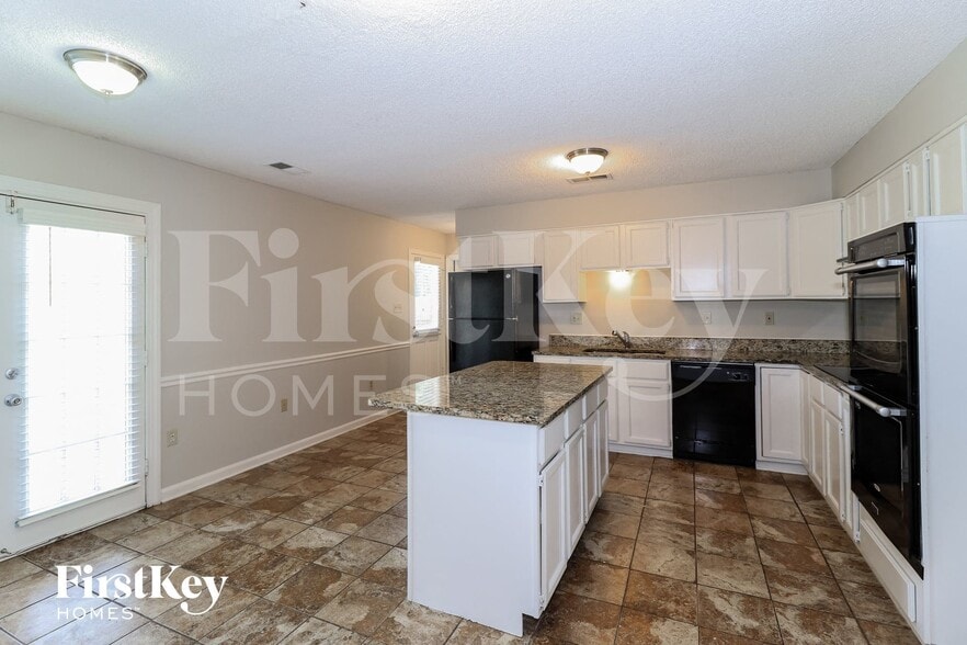 Building Photo - 8688 Chimneyrock Blvd.