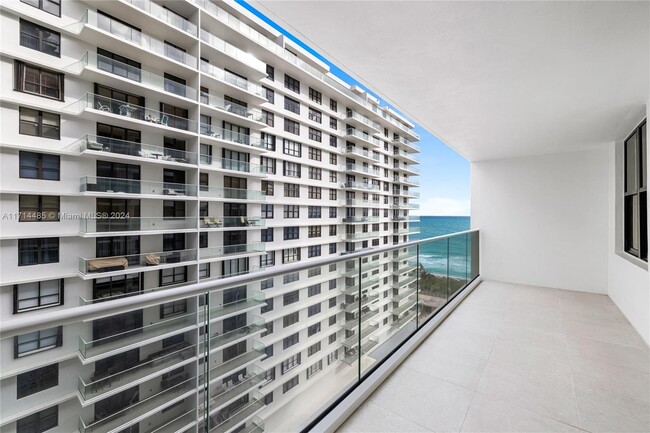 Building Photo - 9801 Collins Ave