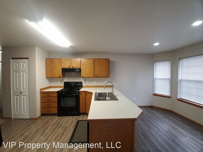 Building Photo - 4 br, 2.5 bath House - 3104 N. 8th Street