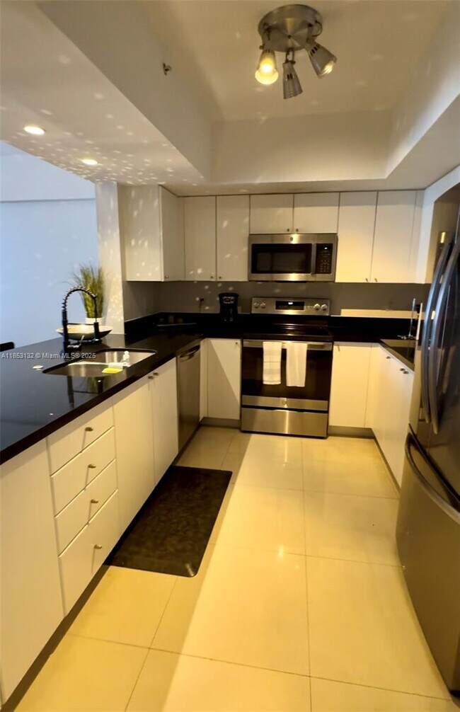 Building Photo - 17375 Collins Ave