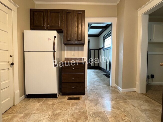 Building Photo - Three bedrooms, one and a half baths