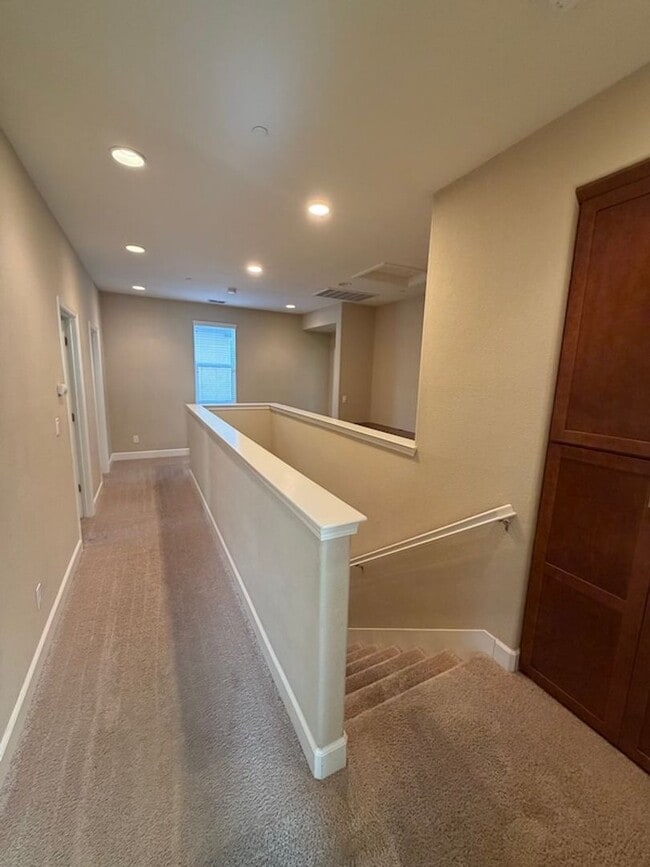 Building Photo - Solar Home with EV Garage Charging. 4 Bedroom Home with Downstairs Bedroom and Full Bathroom.