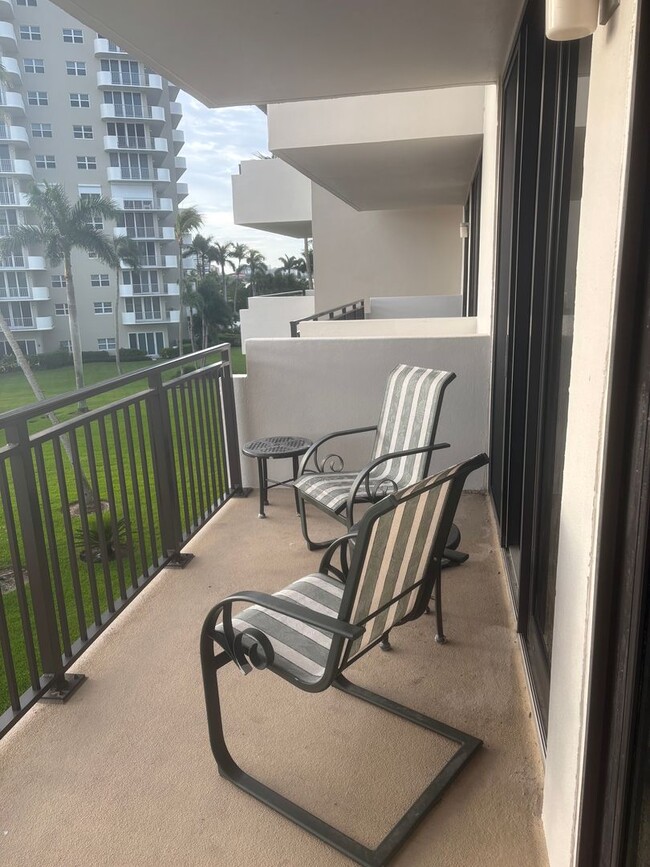 Building Photo - Get your Toes in the Sand at this Fully Furnished One Bedroom Beachfront Condo-Start June 1-2026