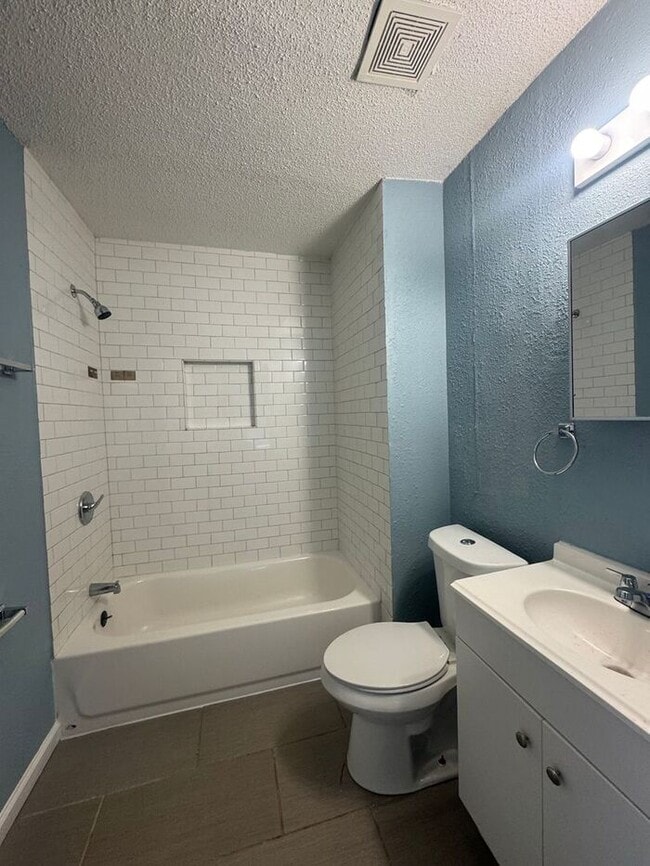 Building Photo - Charming 3BR 2BA Home w/ Fenced Yard + Covered Porch in KC