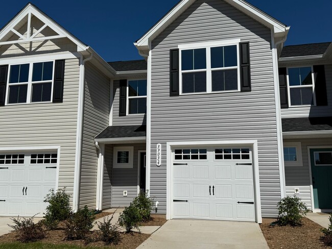 Primary Photo - Modern 3-Bedroom Townhouse with Garage & P...